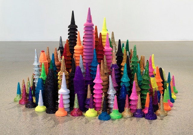 Chila Kumari Burman. Cornets and Screwballs Go Vegas, 2012. Biscuit, plastic, glitter, spray mount, cornets and screwballs, 200 x 100 cm.