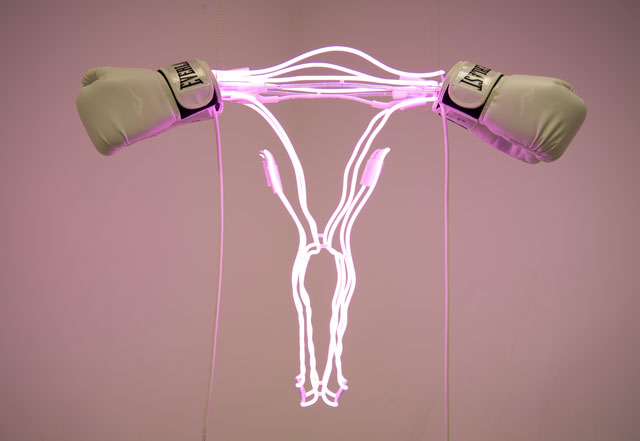 Zoe Buckman. Champ, 2016. Neon, glass, leather, 30 x 18 x 10 in. Courtesy the artist and 21c Museum.