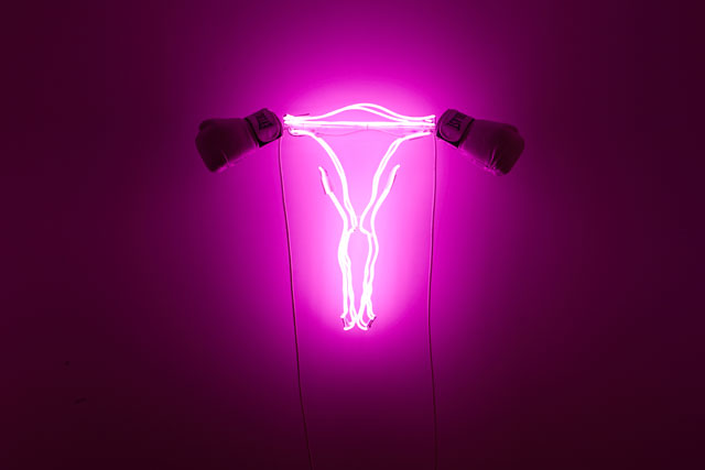 Zoe Buckman. Champ, 2016. Neon, glass, leather, 30 x 18 x 10 in. Courtesy the artist and 21c Museum.