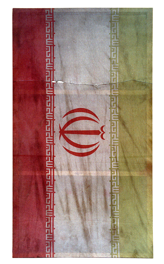 Mahmoud Bakhshi. Air Pollution of Iran, 2004. Installation view, eight synthetic fabric flags, each 235 x 139 x 5.5 cm © Mahmoud Bakhshi, courtesy of the artist and narrative projects, London.