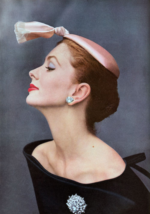Cristobal Balenciaga. Cocktail hat of ivory silk satin, 1953. Originally published in Vogue, October 15, 1953. Photo: John Rawlings.