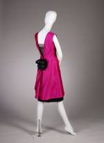 Cristobal Balenciaga. Cocktail dress of fuchsia silk shantung and black lace with black silk satin ribbons, summer 1966. Fine Arts Museums of San Francisco, the Eleanor Christensen de Guigne Collection (Mrs Christian de Guigne III), gift of Ronna and Eric Hoffman. Photo by Joe McDonald/Fine Arts Museums of San Francisco.