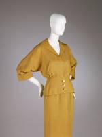 Cristobal Balenciaga. Suit of mustard-yellow linen, summer 1950. Collection of Hamish Bowles. Photo by Joe McDonald/Fine Arts Museums of San Francisco.