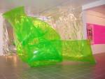 Irene Barberis. <em>Breath, Air, Light</em>, 2006. Float knot, self portrait, wall drawing in light. Float knot: 100cms x 350cms, self portrait, 100 x 280 cms. Fluorescent green pvc, artists breath, digital print on trace, flexible light, reflective foil, tape. © the artist  Photo artist. Cite International Des Arts, Gallery 2, Paris.