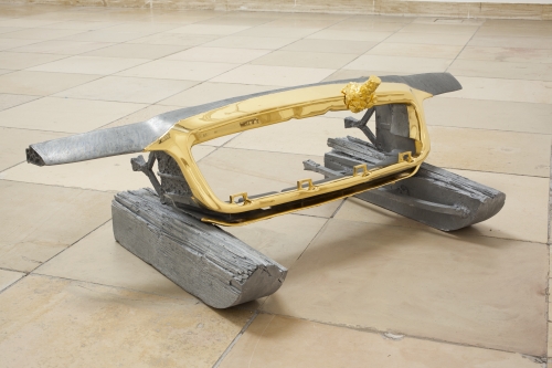 Matthew Barney. Crown Zinc, 2013. Cast zinc and gold plating, 16 1/2 × 57 × 28 in, courtesy Laurenz Foundation, Schaulager, Basel, installation view of Matthew Barney: RIVER OF FUNDAMENT at Haus der Kunst, 2014. Photograph: Maximilian Geuter.