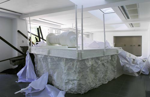 Matthew Barney. <em>Holographic Entry Point,</em> 2005. Self-lubricating plastic, polycaprolactone thermoplastic, shrimp shells, sea shells, cement, wood, steel, stainless steel, expanded polystyrene, vivac, pigment, acrylic paint, acrylic medium, sand, aquaplast, PVC. Installation at the Serpentine Gallery, London. Photograph © Hugo Glendinning