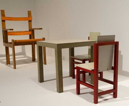 Marcel Breuer. Children's table and chairs, 1923 (foreground). Klassik Stiftung Weimar, Bauhaus Museum. Photograph: Jane Hobson 2012. Courtesy of Barbican Art Gallery.