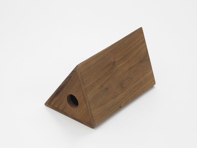 Becky Beasley. Camera I, 2014. Walnut, black lacquer, 17.5 x 10.7 x 10 cm. Courtesy: Laura Bartlett Gallery, London.