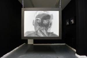 Toby Ross-Southall. Empirical Provocations, (Installation View), 2010. 144 slides, slide projectors, chain, rear projection PVC screen mounted in box frame, dimensions variable. © the artist.