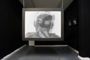 Toby Ross-Southall. Empirical Provocations, (Installation View), 2010. 144 slides, slide projectors, chain, rear projection PVC screen mounted in box frame, dimensions variable. © the artist.