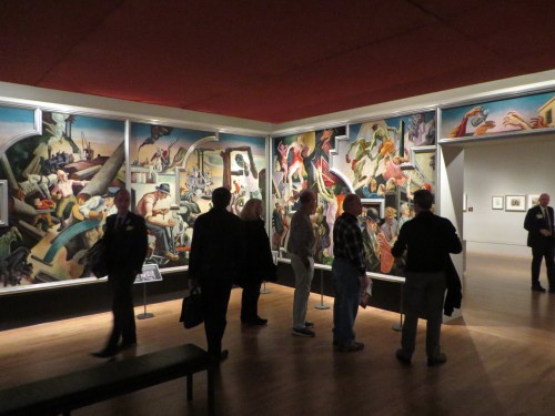 Museum visitors viewing panels of America Today (left to right): Midwest, Deep South, City Activities with Subway, and Outreaching Hands. Each: distemper and egg tempera on gessoed linen with oil glaze.