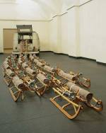 Joseph Beuys, Das Rudel (The Pack), 1969. Volkswagen bus with twenty-four wooden sleds, each with felt, flashlight, fat and stamped with Braunkreuz (brown oil paint). Photo Tate Modern