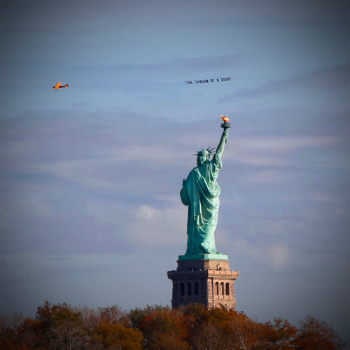 David Birkin. The Shadow of a Doubt, 2014. Aerial performance over New York Harbor, Veterans Day, 11/11.