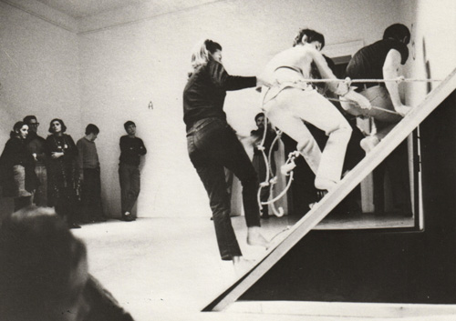 Claudio Abate. Simone Forti with Fabio Sargentini Piano Inclinato/Slant Board, L'Attico, Rome, 1972/2015. Vintage black and white photograph. Copyright the artist. Courtesy Richard Saltoun Gallery.