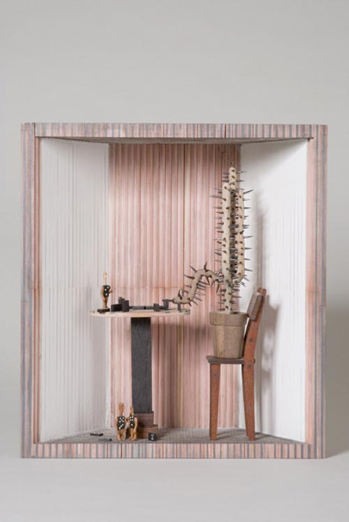 Andràs Böröcz. <em>Cactus Plays Dominoes</em>, 2006. Carved pencils, mixed media construction 13 1/2 x 12 1/2 x 5 1/4 in. Courtesy Adam Baumgold Gallery.