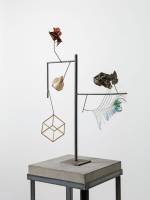 Carol Bove. Heraclitus (detail), 2014. Seashell, feather, found objects, steel, concrete, 182.9 x 45.7 x 31.8 cm. Courtesy the artist, Maccarone, New York and David Zwirner, New York/London.