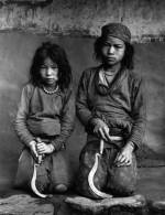 Kevin Bubriski. <em>Tamang sisters with sickles, Lachang village, Nuwakot,</em> 1984. Gelatin silver print, 18 x 14 in. Collection of Kevin Bubriski