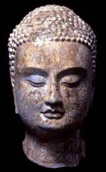 Head 
            of a Buddha, Northern Qi 550-577. Limestone, 23.5 x 0 cm. Qingzhou 
            Municipal Museum, Shandong Province. Photo © The State Administration 
            of Cultural Heritage, People's Republic of China