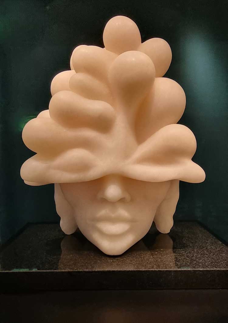 Sasha Constable, Under Cumuli, 2022. Pink alabaster and polished granite base, 41 x 40 x 25 cm. © Sasha Constable.