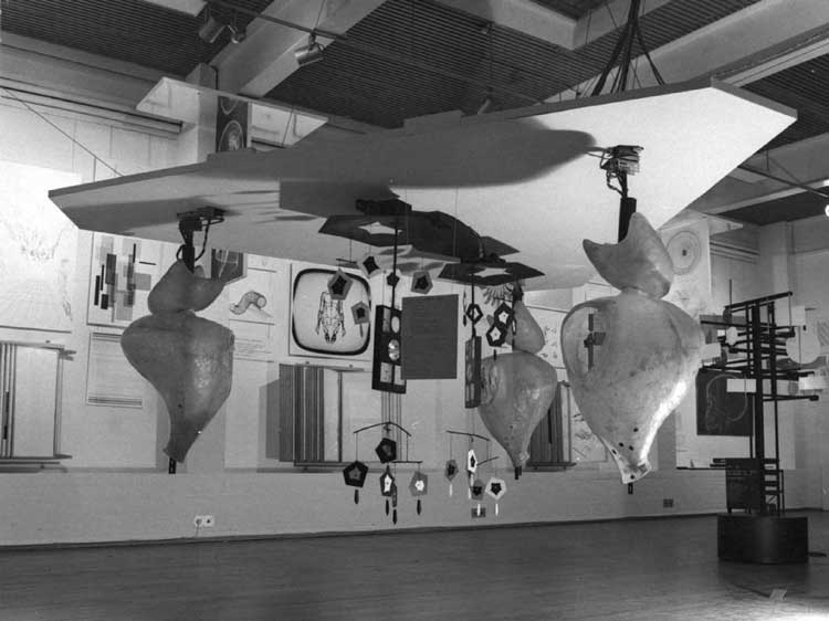 Installation view of Cybernetic Serendipity, Institute of Contemporary Arts, London, 1968, showing Gordon Pask’s Colloquy of Mobiles (hanging from ceiling, foreground). © Cybernetic Serendipity.