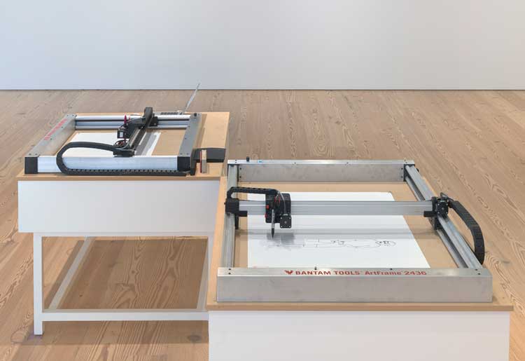 Active plotters drawing images from different periods of the AARON software. Plotter fabricated by Bantam Tools; courtesy Bre Pettis. Installation view, Harold Cohen: AARON, Whitney Museum of American Art, New York, 3 February – 19 May 2024. Photo: Ron Amstutz.