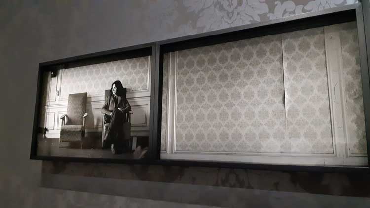 Sophie Calle and the hotel wallpaper. Photo: Ana Duarte.