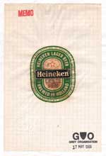 Grey Organisation. Heineken Lager, Life Works series, beer bottle label varnished with the artists hair on graph paper, 1989.