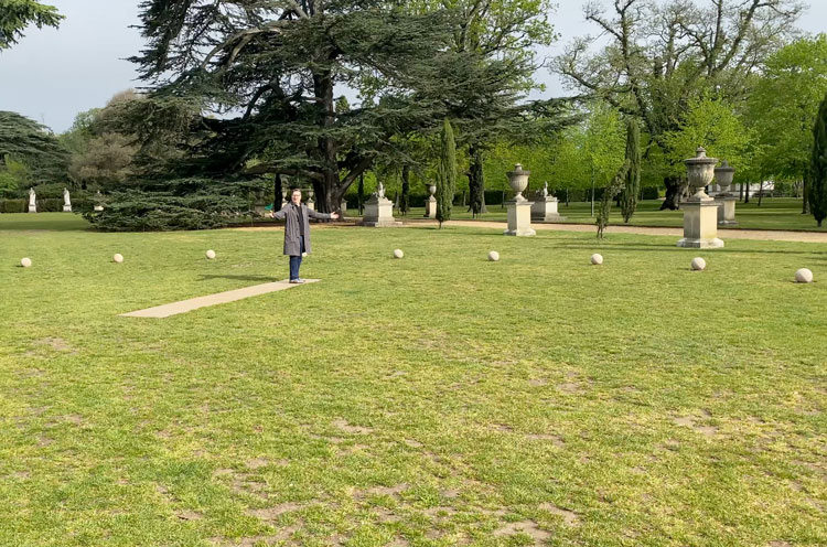 Mark Wallinger with his work British Summer Time, 2021, part of Bring Into Being, Chiswick House and Gardens, London, 2021. Photo: Martin Kennedy.