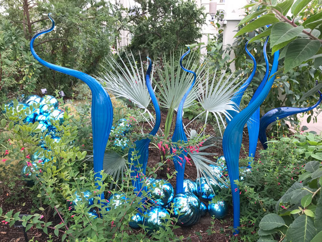 Dale Chihuly. Turquoise Marlins and Floats, blown glass, 2015. Royal Botanic Gardens, Kew, London 2019. Photo: Anna McNay.