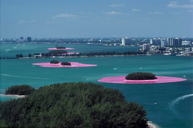 Christo and Jeanne-Claude. Documentary photograph of Surrounded Islands, Biscayne Bay, Greater Miami, Florida, 1980–83. Woven polypropylene fabric surrounding 11 islands, Styrofoam, steel cables, and anchoring system, 6.5 million sq ft of fabric overall. Photo: Wolfgang Volz © Christo 1983.