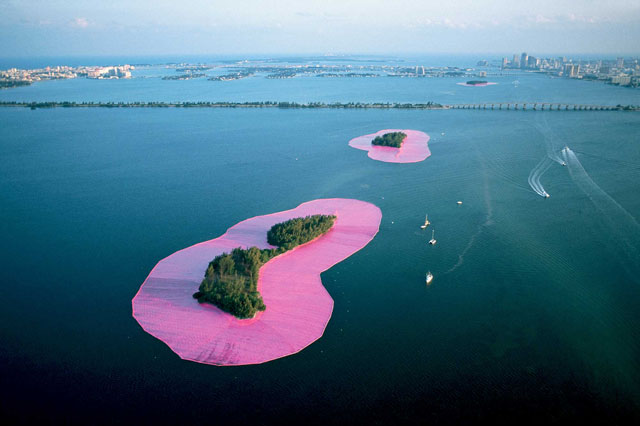 Christo and Jeanne-Claude. Documentary photograph of Surrounded Islands, Biscayne Bay, Greater Miami, Florida, 1980–83. Woven polypropylene fabric surrounding 11 islands, Styrofoam, steel cables, and anchoring system, 6.5 million sq ft of fabric overall. Photo: Wolfgang Volz © Christo 1983.