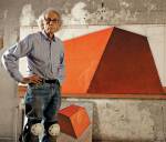 Christo in his studio with a preparatory drawing for The Mastaba, 2012. Photo: Wolfgang Volz. © 2012 Christo.