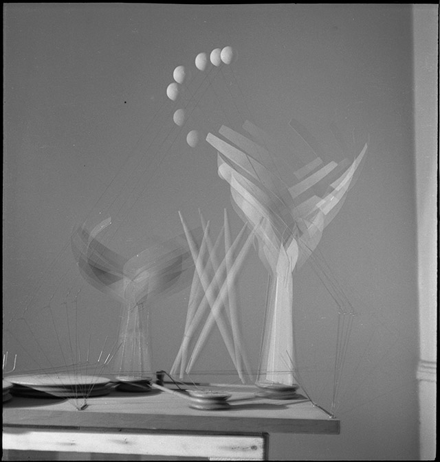 Alexander Calder. Dancers and Sphere (maquette for 1939 New York World’s Fair) set in motion in Calder’s small shop New York City storefront studio, 1938. © 2017 Calder Foundation, New York / Artists Rights Society (ARS), New York. Photograph: Herbert Matter, courtesy Calder Foundation, New York.