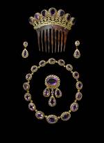 Parure, Cartier Paris, v 1860. Or, améthystes de forme ovale et poire facettées, écaille collier 42.5 cm; peigne 11.3 x 12 cm; Broche 8 x 4 cm; Boucles d’oreille 4 x 1.7 cm. Collection Cartier. Photograph: V. Wulveryck, Collection Cartier © Cartier.