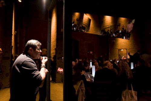 Xavier Cha. Clown Gala, 2007. Two-way mirrors, professional clowns. Men and women transform from pedestrian dress to fully fledged clowns in front of two-way mirrors during the Sculpture Center Winter Gala honouring Jenny Holzer. Art event becomes voyeuristic clown factory.