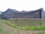 Building number 14 with its iconic curved tile roof form.