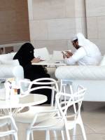 Two viewers taking a lunch break in Alain Ducasse restaurant in Qatar’s Islamic Museum.