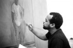 Noah Davis at work, Los Angeles, 2009. Courtesy Patrick O’Brien-Smith Photo: Patrick O’Brien-Smith.