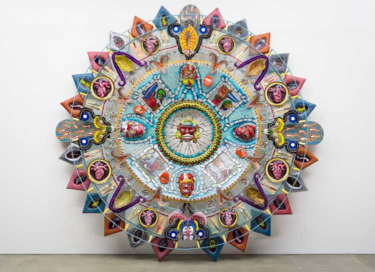 Oxymodern (Aztec Calendar) by Einar and Jamex de la Torre, 2002. Blown-glass, mixed-media wall installation, 120 x 120 x 12 in. Photo credit: Courtesy of the Cheech Marin Collection and Riverside Art Museum.