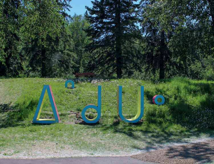 Amy Malbeuf. Iskotew, 2018. Painted steel, the syllabics range in height, 91–183 cm (3–6 ft). Photo: Edmonton Arts Council.
