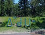 Amy Malbeuf. Iskotew, 2018. Painted steel, the syllabics range in height, 91–183 cm (3–6 ft). Photo: Edmonton Arts Council.