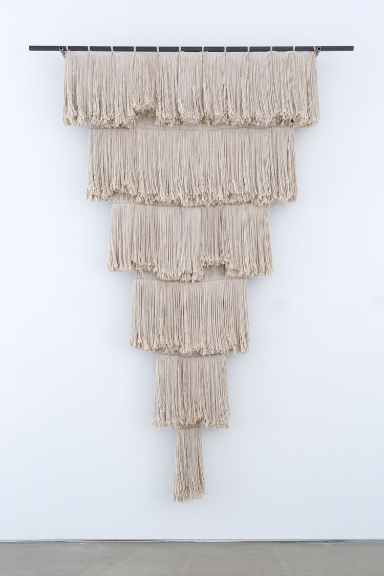 Alexandre da Cunha. Kentucky (Drop), 2013. Mop heads, metal, fittings, 285.1 x 200 x 21.6 cm (112 1/4 x 78 3/4 x 8 1/2 in). © Alexandre da Cunha. Courtesy the artist, Thomas Dane Gallery and Galeria Luisa Strina, São Paulo.