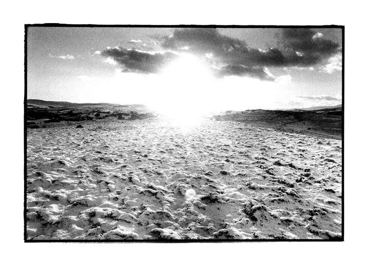Toby Deveson, Caer Euni, Gwynedd, Wales, December 2001. Silver Gelatin print. Taken with a Nikkormat using a 24mm lens and Kodak T-Max 400 film. Printed on Foma 532 fibre-based paper.