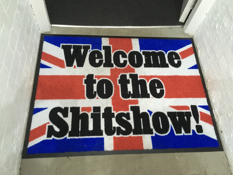 Welcome mat at the entrance to Jeremy Deller, Putin’s Happy, 2019, Hannah Barry Gallery.