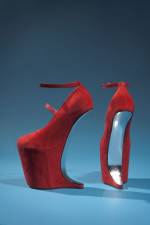 Red suede shoes by Nina Ricci. From the collection of Daphne Guinness, to be featured in the exhibition <em>Daphne Guinness</em>. Photograph courtesy The Museum at FIT.