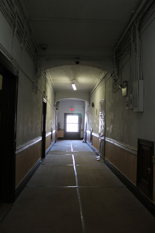 Chelsea Hotel 10th-floor hallway, west side, during first phase demolition 2011. Photograph: Miguel Benavides. © Studio International.