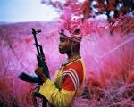 Richard Mosse. Safe From Harm, North Kivu, eastern Congo, 2012. Digital C print, 48 x 60 inches. © Richard Mosse. Courtesy of the artist and Jack Shainman Gallery.