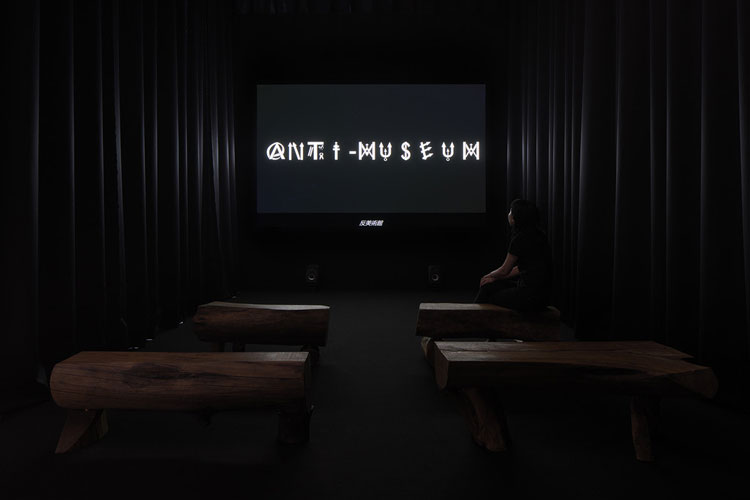 Installation view of The Anti-Museum: Anti-Documentary 2021, 2K video 30’ 48”. Typography by Jacques Villeglé. Photo copyright Nacása & Partners Inc / Courtesy of Fondation d’entreprise Hermès.