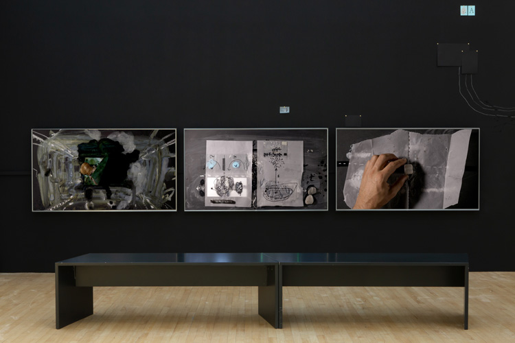 Nikolaus Gansterer. untertagüberbau, 2017. Three channel HD video installation. Installation view, The Extended Mind, 2019. Image courtesy Talbot Rice Gallery, The University of Edinburgh.