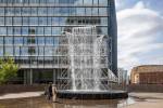 Olafur Eliasson. Waterfall, 2019. Scaffolding, water, wood, plastic sheet, aluminium, pump, hose, height 11 metres, diameter 12 metres. Courtesy the artist; neugerriemschneider, Berlin; Tanya Bonakdar Gallery, New York / Los Angeles. Installation view, Tate Modern, London. Photo: Anders Sune Berg. © 2019 Olafur Eliasson.